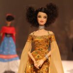 woman in gold floral dress