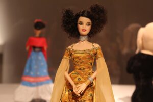 woman in gold floral dress
